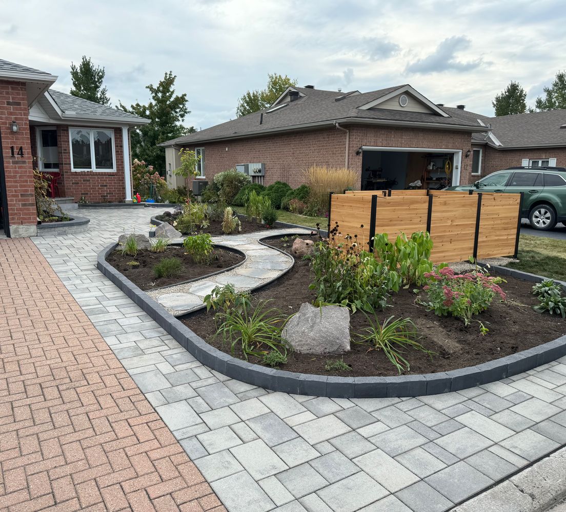 Front yard with landscaping and new stone work